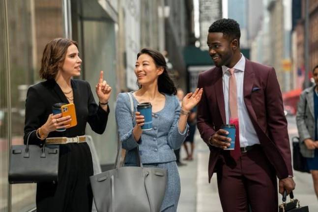 “Partner Track” associates one-up and backstab along with their aspiring and impeccably dressed colleagues. Photo: Netflix
