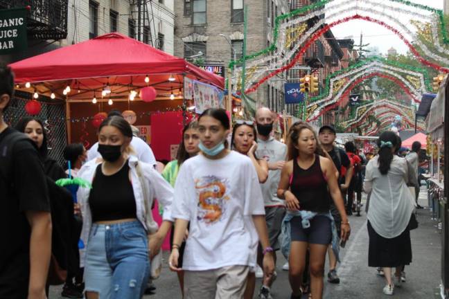 Crowds gather on Mulberry St. to enjoy the festival. Photo: Gaby Messino
