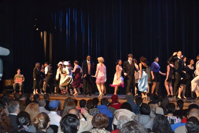 Students from Repertory Company High School for Theatre Arts perform number from The Drowsy Chaperone.