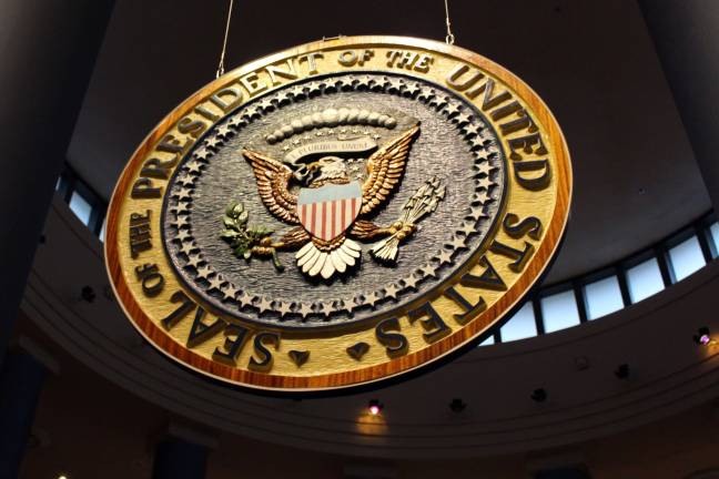 Atlanta sculptor Charles Mitchell carved this mahogany presidential seal. It hung in the reviewing stand during President Carter's inaugural parade.