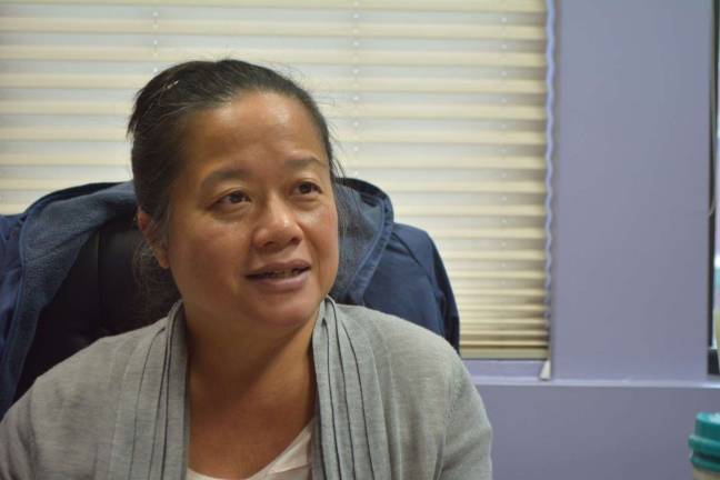 Dr. Lisa Eng in her Mott Street office. Photo: Virginia Gunawan