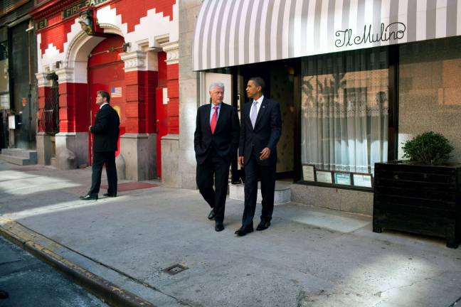 Then-President Barack Obama with ex-President Bill Clinton after a 2009 lunch at Il Mulino's on West Third Street in Greenwich Village. Barack and Michelle Obama have been coming to Manhattan for years, and are now thinking of living here. The First Couple have been touring duplexes at 10 Gracie Square.&#xa0;Photo: Official White House photographer Pete Souza, via flickr