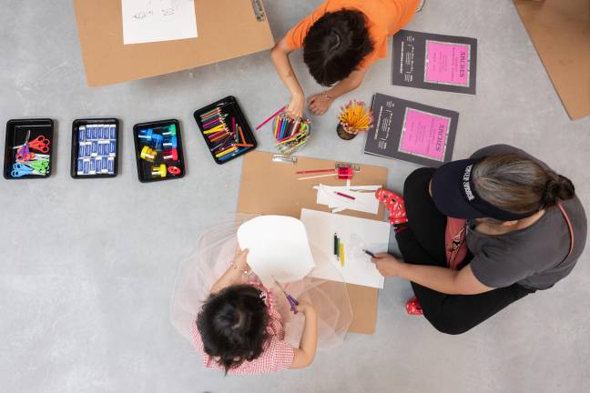Children take part in hands-on art making activities during West Side Fest.