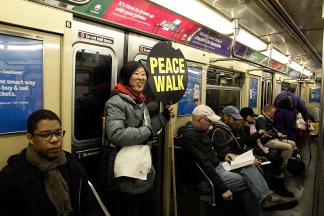 Walkers took their message of peace underground. Photo: Melody Chan