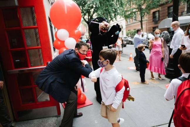 Head of school John Botti greets students at the Browning School on the Upper East Side. Photo courtesy of the Browning School