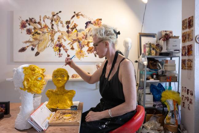 An artist works in her studio as part of West Side Fest-related programming.