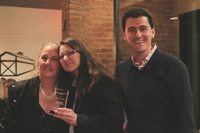 From left, Borough President Gale Brewer, Beth Scholten of Down &amp; Quilt Shop, and Ken Bibera,j VP of the Ansonia Democrats. Photo by Rachel Finley