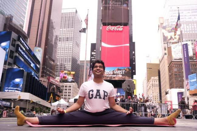 Summer Solstice Yoga: Mind Over Madness event with attendee finishing Marco Rojas 1:30 p.m. class. Photo: Beau Matic