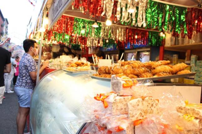 Shop offers an assortment of Italian goods and desserts for the feast. Photo: Gaby Messino