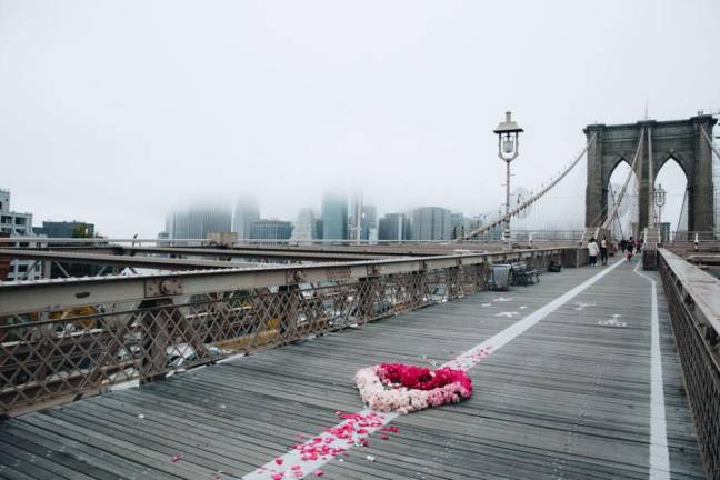 On the Brooklyn Bridge. Photo: Erica Reade