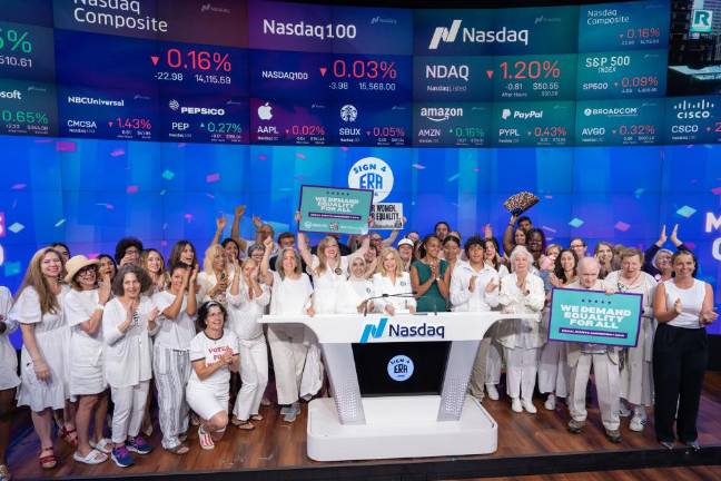 Former Congresswoman Carolyn Maloney leads a crowd of advocates for the Equal Rights Amendment who gathered at the NASDAQ exchange to ring the closing bell.