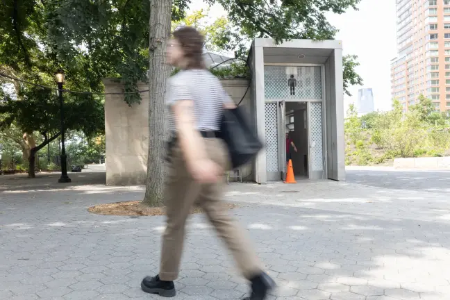 People use a public restroom in The Battery in Lower Manhattan, Aug. 27, 2026.