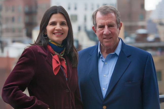 Mary Skafidas and Andrew Tisch compiled and edited &quot;Journeys: An American Story,&quot; 72 essays that recount the histories of families arrival and experience in the United States. Photo courtesy of Loews Corp.