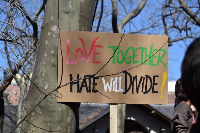 A hand-painted sign in Columbus Park on Sunday, March 20. Photo: Leah Foreman