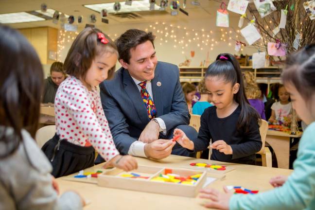 City Council Member Ben Kallos with preschoolers at the Manhattan Schoolhouse on the Upper East Side last year. He's sponsoring a bill, supported by the Speaker and likely to pass, that would bolster nutritional standards for beverages served to kids in thousands of city restaurants. Photo: Office of Ben Kallos