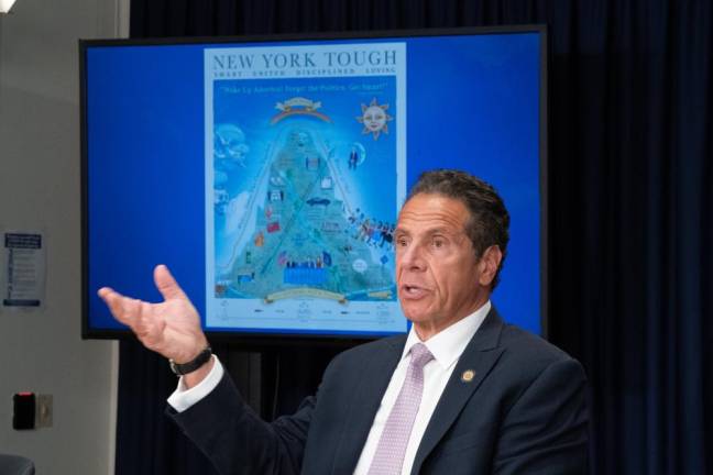 Governor Andrew M. Cuomo created a poster to depict the “mountain” of New York’s COVID experience. (Photo: Don Pollard / Office of Andrew M. Cuomo)