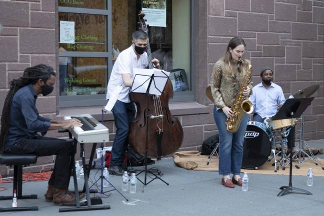 Musicians (left to right) Elio Villafranca (piano), Peter Slavov (acoustic bass), Roxy Coss (tenor sax) and Francisco Mela (drums) at Friday’s pop-up event in Chelsea. Photo: Azita Panahpour