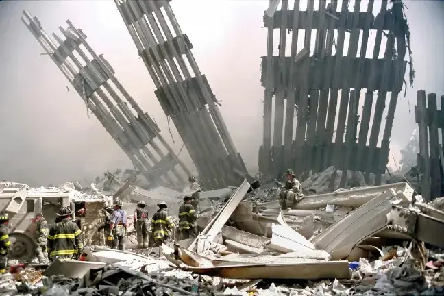Photographer Peter Foley was able to capture firefighters digging on the rubble because one of the lieutenants from the West Side firehouse where Foley had lived for a year smuggled him on board a bus transporting firefighters to search for survivors at Ground Zero the evening after the towers collapsed.