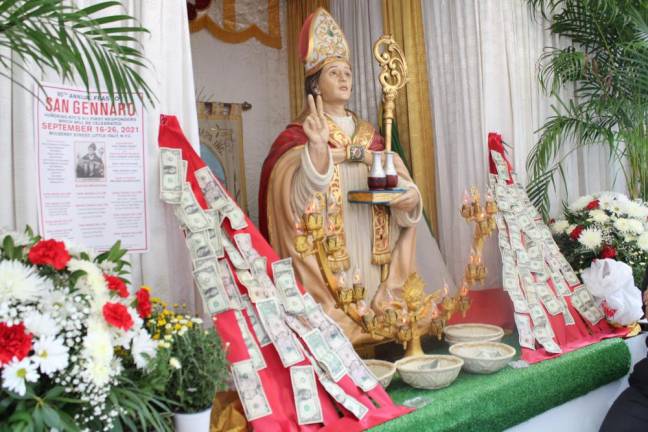 The statue of Saint Gennaro blessing the festival. Photo: Gaby Messino