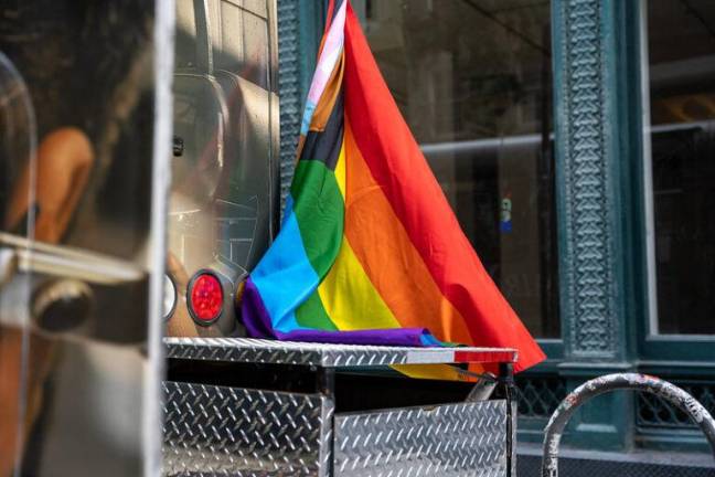Young keeps a pride flag on her van to encourage people of all gender identities, sexual orientations, and races to get a haircut at her shop. Photo: Nathan Morris