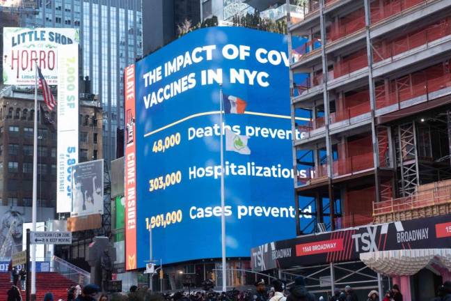 Statistics about impact of COVID vaccines as Mayor Eric Adams speaks in Times Square on Friday, March 4, 2022. Photo: Michael Appleton/Mayoral Photography Office