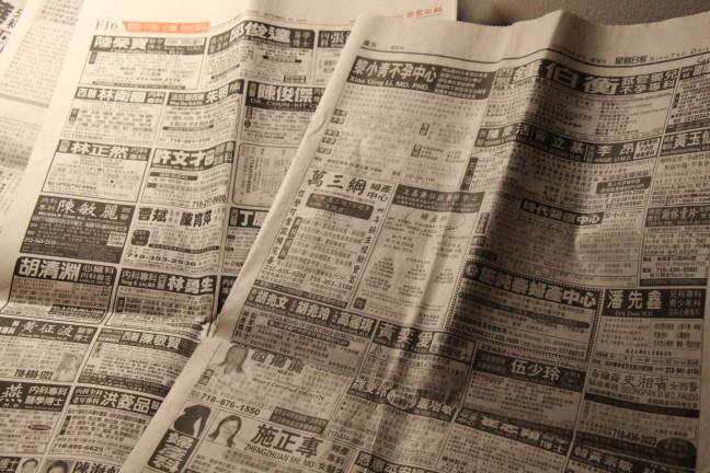 Chinese language newspapers sold in New York City carry a prolific selection of abortion ads, some of them also offering early gender tests.&#160;Photo: Rui Miao