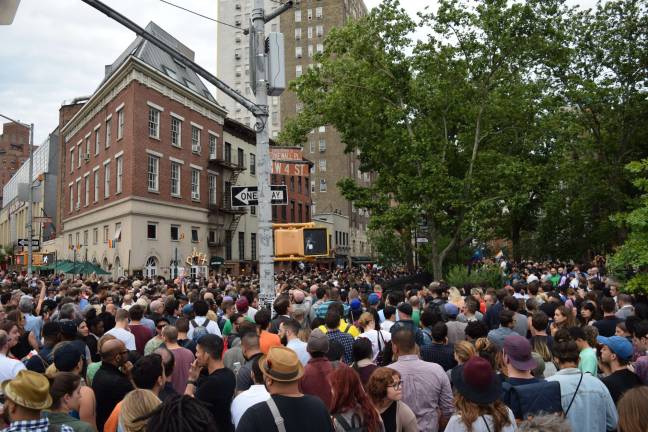 Seventh Avenue at Stonewall Place on Monday evening during a commemoration of the lives lost in the mass shooting in Orlando. Photo: Isodro Camacho