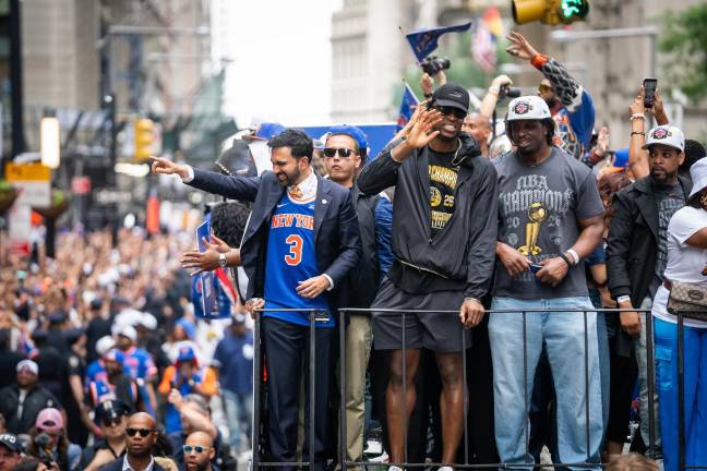 Knicks parade with Mayor Zohran Mamdani in a No. 3 Josh Hart jersey.