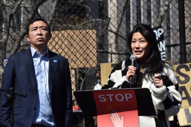 Evelyn Yang (right) with her husband, mayoral candidate Andrew Yang, talked about misogyny and racism at Columbus Park on March 20. Photo: Leah Foreman