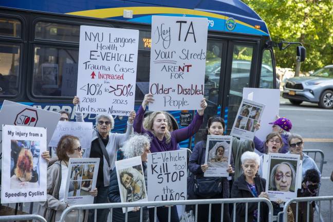 Janet Schroeder, Co-Founder and Director of NYC E-Vehicle Safety Alliance, leading the protest on June 1 alongside other EVSA members and victims of e-vehicle accidents or those involving speeding bicyclists.