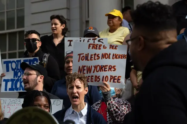 Homeless rights and community advocates rally on the steps of City Hall in favor of a pair of bills to increase the number of publicly accessible bathrooms across the five boroughs, Sept. 19, 2024.