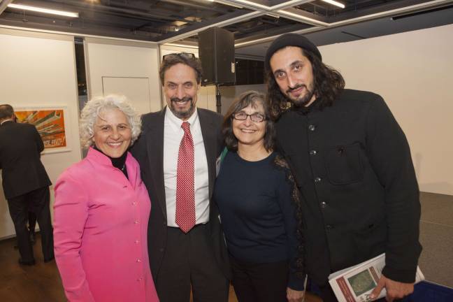 Straus News President Jeanne Straus with WESTY Award winner Stephan Russo, Executive Director of Goddard Riverside Community Center, with his wife and son. Photo by Mary Newman
