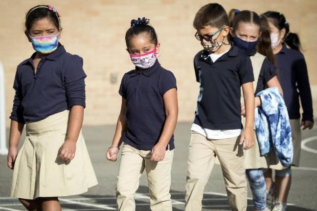 Students return to school in Ozone Park, Queens. Tuesday, September 21, 2021. Photo: Ed Reed/Mayoral Photography Office.