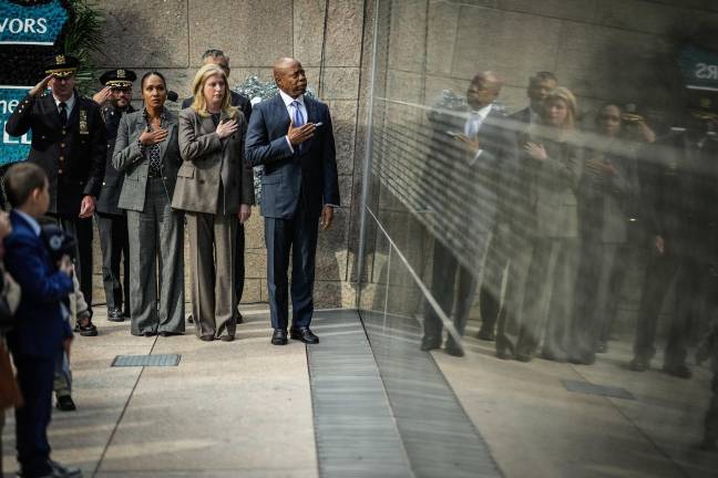 Mayor Adams (right), NYPD Commissioner Jessica Tisch(next to him), and others at the NYPD Memorial ceremony, Oct. 15, 2025.