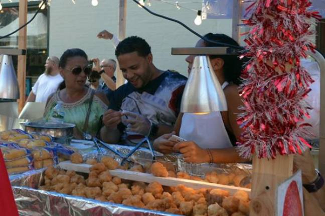 Food is an intregal part of the San Gennaro festival now underway in Little Italy. Photo: San Gennaro Gallery