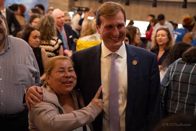 Rep. Goldman is seen taking pictures with supporters who are still optimistic about Goldman and his mission.