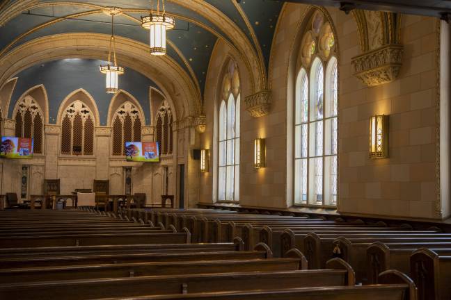 The largest chapel, which holds over 300 people, is called the Gothic chapel, and features stained glass windows and murals.