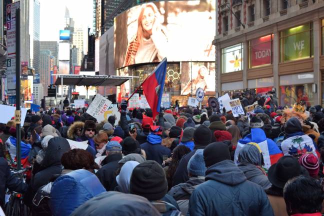 Protesters gathered in Times Square on Martin Luther King Jr. Day for an anti-racism rally following reports of President Donald Trump&#x2019;s disparaging comments about Haiti and other countries. Photo: Michael Garofalo