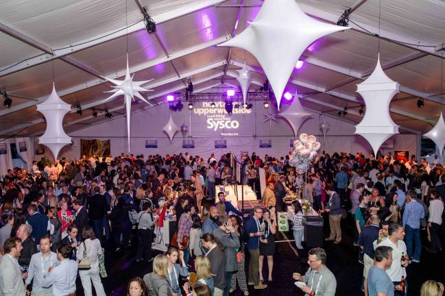 Attendees at New Taste of the Upper West Side food festival, which kicks off on May 27, sample some of the neighborhood's finest cuisine. Photo: Ken Goodman