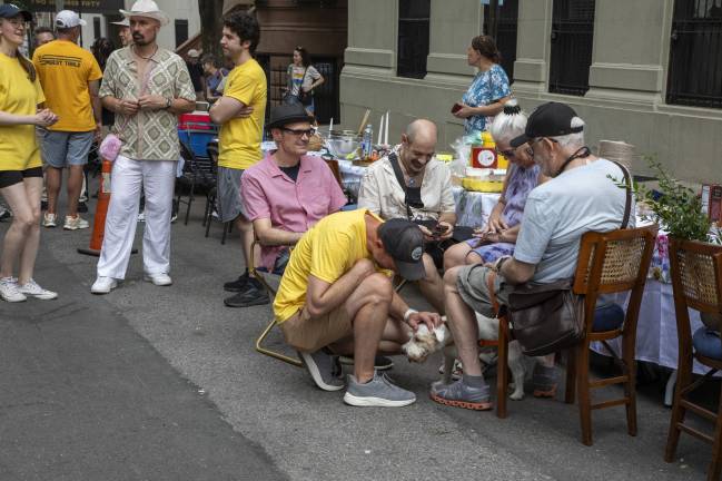 Dogs and young children were also among those who attended the event, running up and down the street as the evening went on.