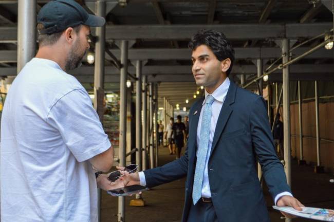 Suraj Patel made his pitch to voters on election day. Photo: Abigail Gruskin