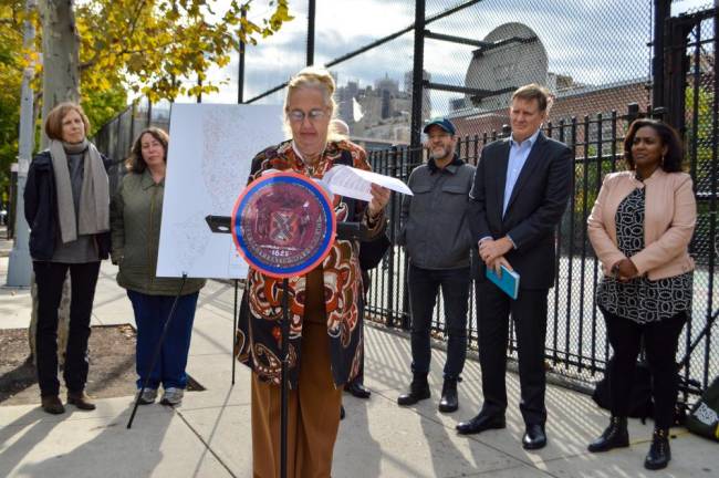 UWS Council Member Gale Brewer (at podium) announced her intent to revitalize the “Schoolyards to Playgrounds” program outside of P.S. 9 on Tuesday. Photo: Abigail Gruskin