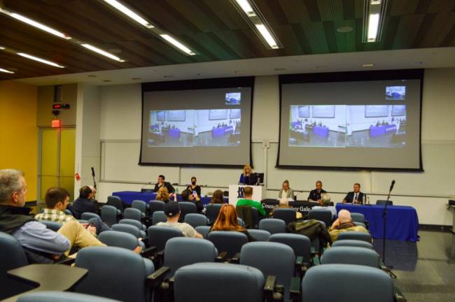 A panel of speakers, including NYS Assembly Member Linda Rosenthal (at podium), addressed questions about new cannabis regulations on Tuesday, December 13 at the John Jay College of Criminal Justice. Photo: Abigail Gruskin
