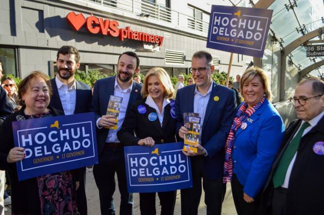 From left to right: State Senator Liz Krueger, NYS Assembly District 73 winner Alex Bores, Council Member Keith Powers, Rep. Carolyn Maloney, Manhattan Borough President Mark Levine, NYS Assembly Member Rebecca Seawright and Rep. Jerrold Nadler campaigned with Gov. Kathy Hochul on Election Day. Photo: Abigail Gruskin