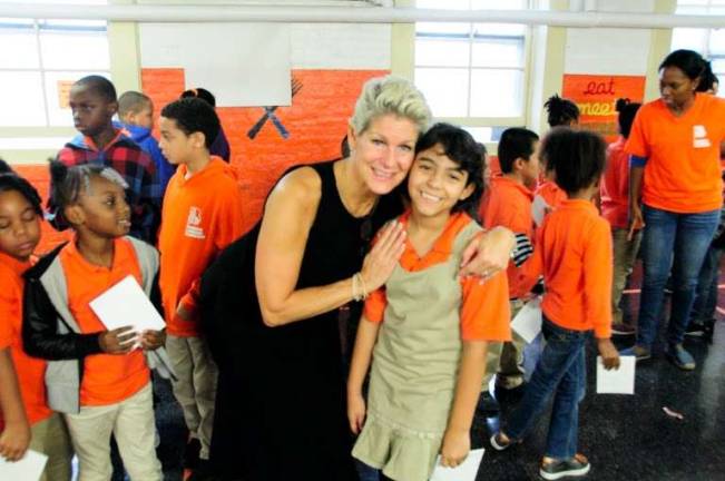 Louise Phillips Forbes, a board member of Change for Kids, at Brooklyn Landmark Elementary School in 2014. Photo: Courtney Lamb