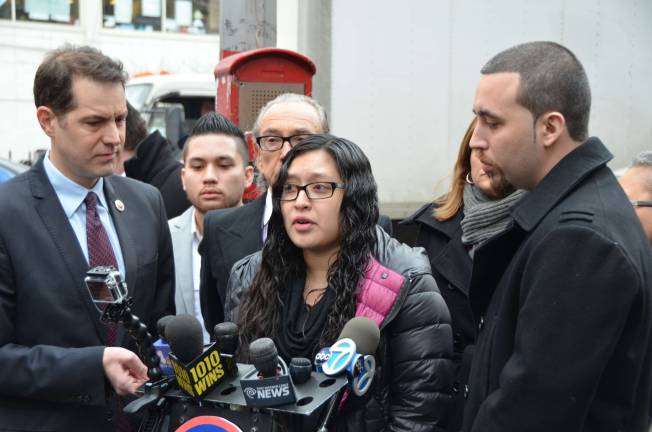 Sofia Russo, at microphone, at a press conference after the death of her daughter, Ariel.