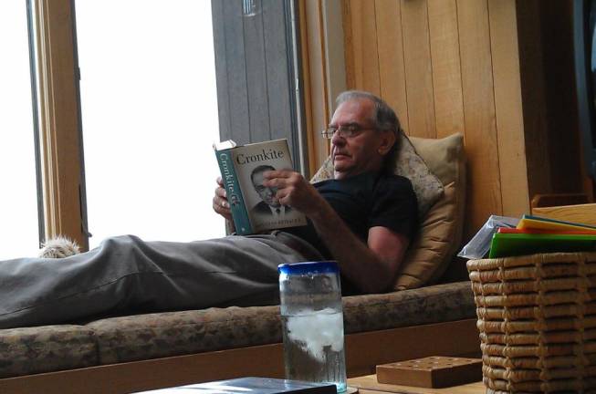 Dave Rosenstein, who battled heroin in his youth and then spent the rest of his adult life fighting for a drug-free city, in a familiar pose recently - reading a book. He died on March 2 at the age of 75.