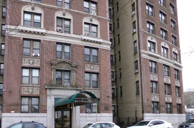 The Landmarked, 109 year old building at 409 Edgecombe Ave. in the Sugar Hill Historic District on the UWS is finally free of scaffolding after 21 years. Photo: Noah Augustin