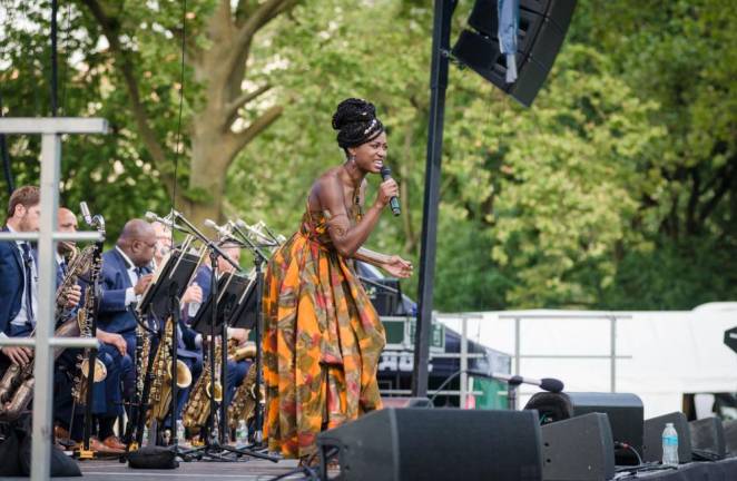 Shenel Johns sings with Jazz at Lincoln Center for the opening night of NYC SummerStage 2021 in Central Park. Photo: Sean J. Rhinehart