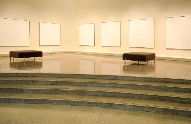 Agnes Martin’s spare, square canvases reward patient viewing as seen in “The Islands I–XII,” 1979, in acrylic and graphite on linen, 12 parts, each 6 square feet. Photo: Adel Gorgy